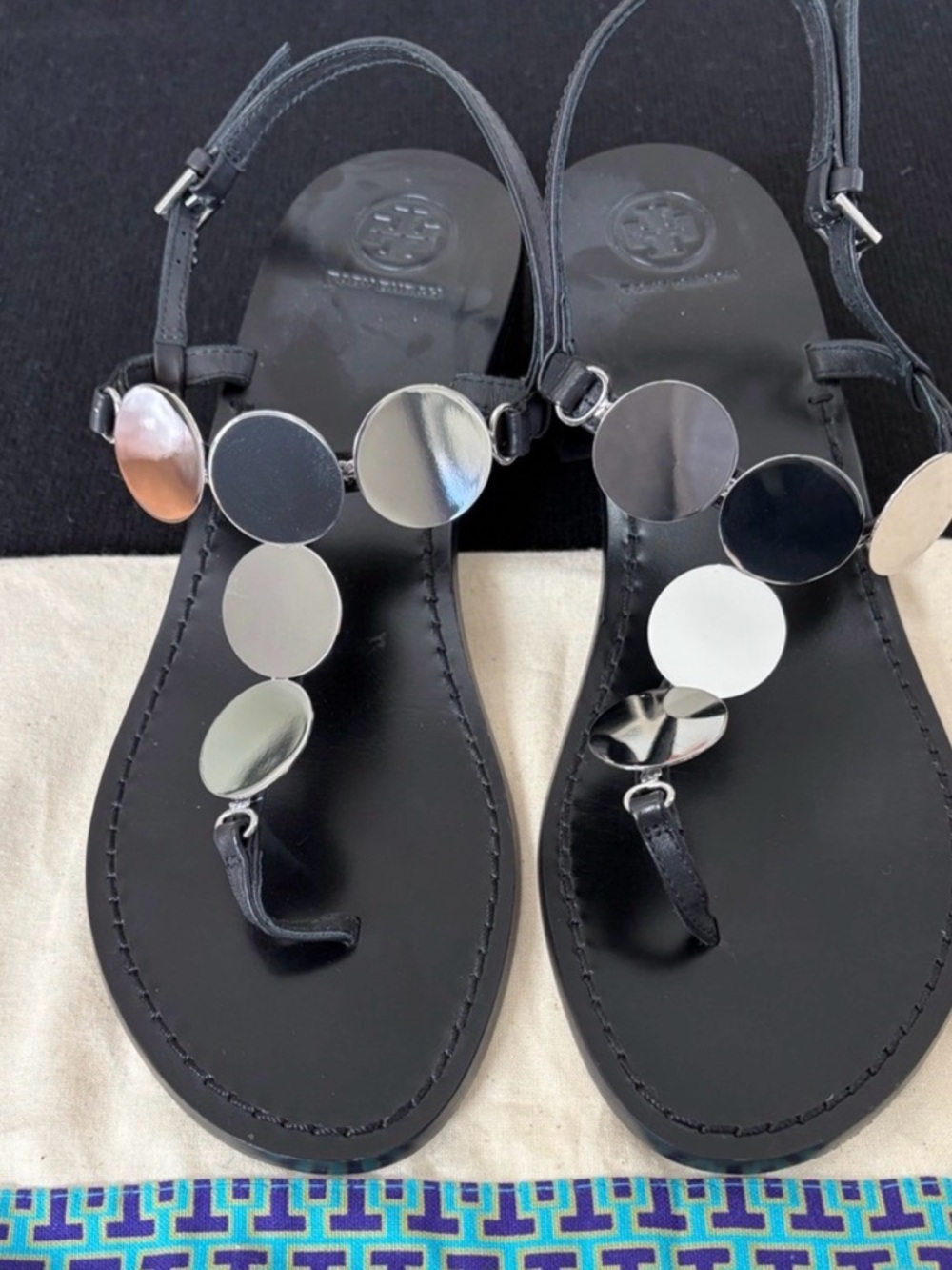 Tory Burch Black Leather T-Strap Sandals with Mirror Disc Accents